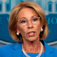 Illustration for article titled Betsy DeVos Shovels Coronavirus Money to a College People Have Confused With a Cult